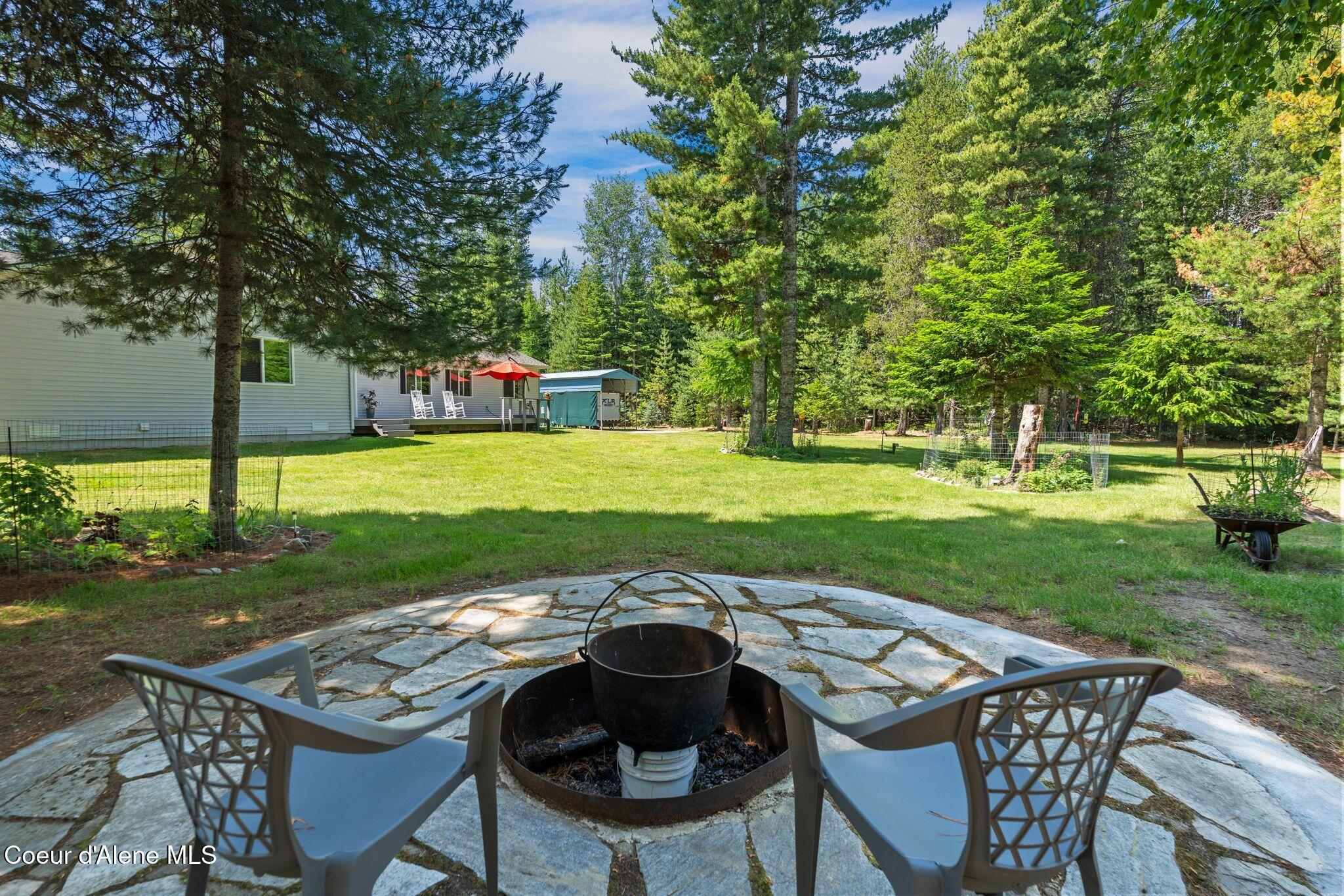 249 Indigo Sky Road Sandpoint, ID 83864 - Photo 10 of 71 Slate accented firepit