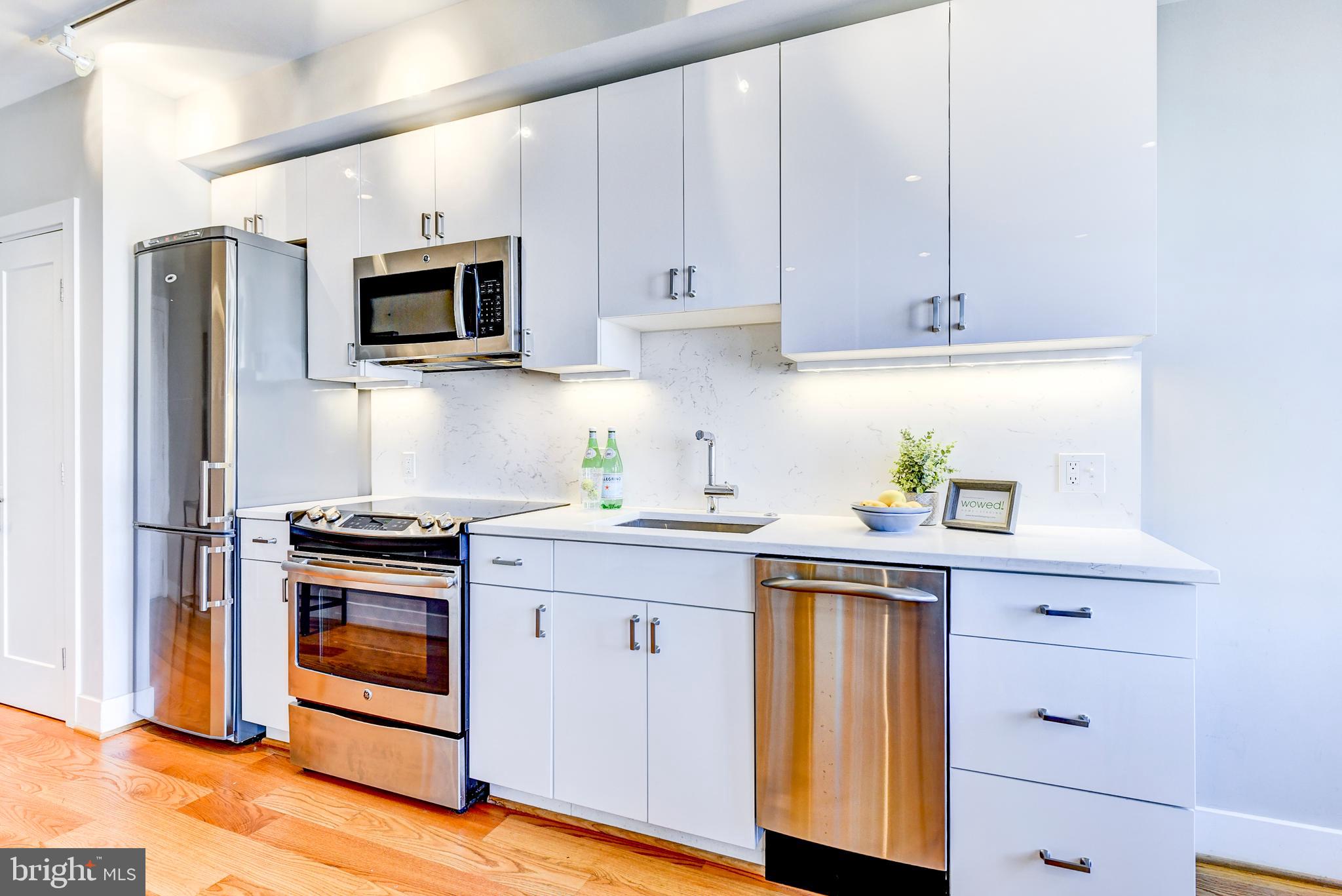 1209 G Street Southeast, Unit 10 Washington, DC 20003 - Photo 10 of 28 High-gloss European-styled lacquer cabinets