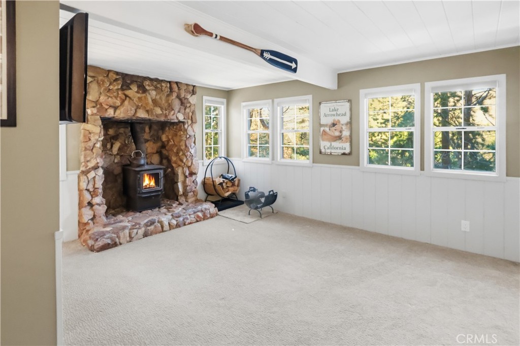 174 Golf Course Road Lake Arrowhead, CA 92391 - Photo 24 of 71 a view of a livingroom with a window and storage