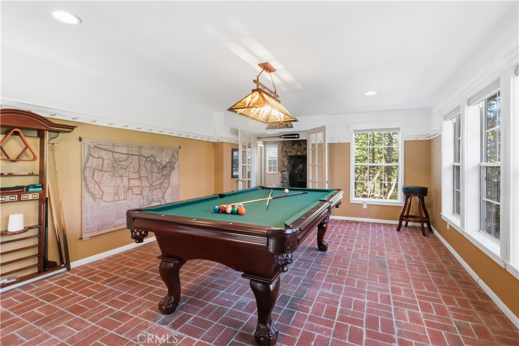 174 Golf Course Road Lake Arrowhead, CA 92391 - Photo 27 of 71 a room with pool table and windows