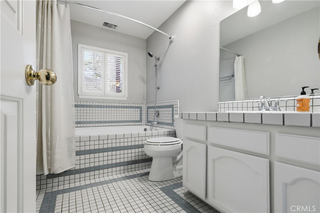 174 Golf Course Road Lake Arrowhead, CA 92391 - Photo 41 of 71 a bathroom with a sink a toilet and shower