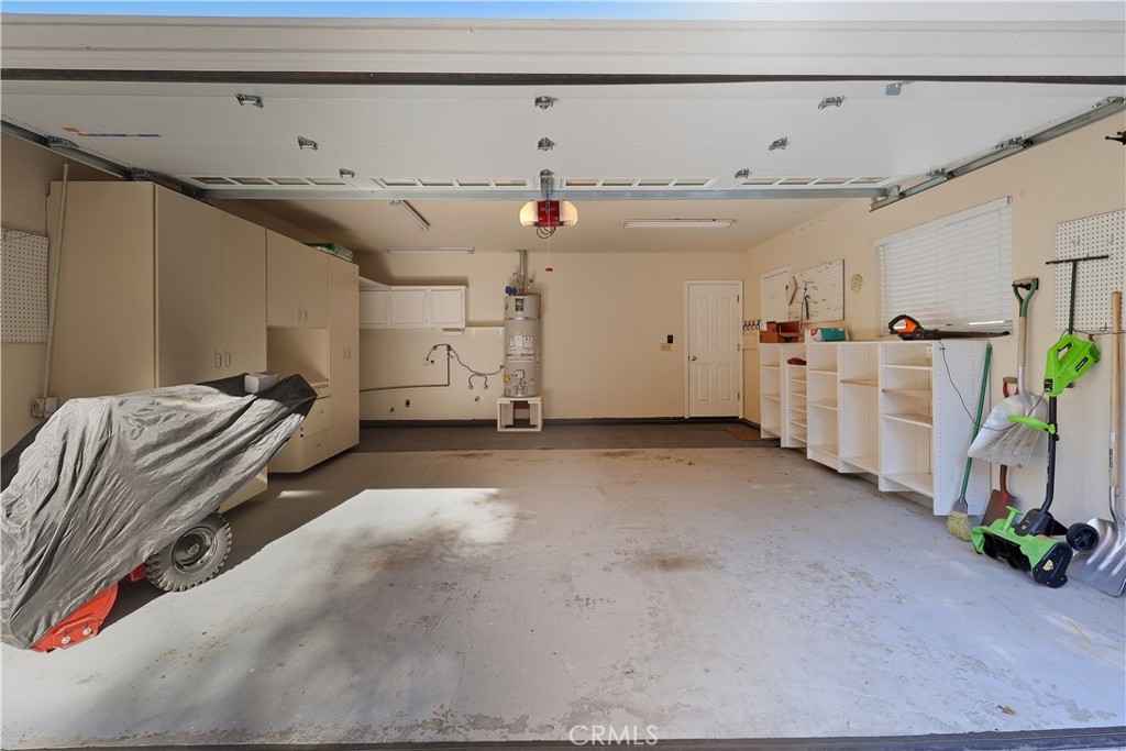 174 Golf Course Road Lake Arrowhead, CA 92391 - Photo 57 of 71 a view of a garage room