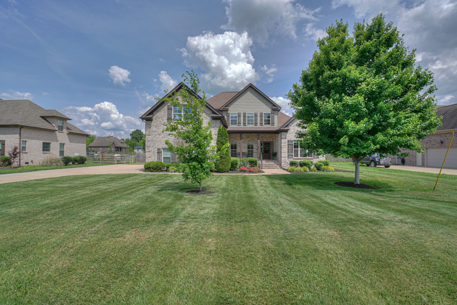 9620 Mona Road Murfreesboro, TN 37129 - Photo 1 of 58 a view of a house next to a big yard and large trees