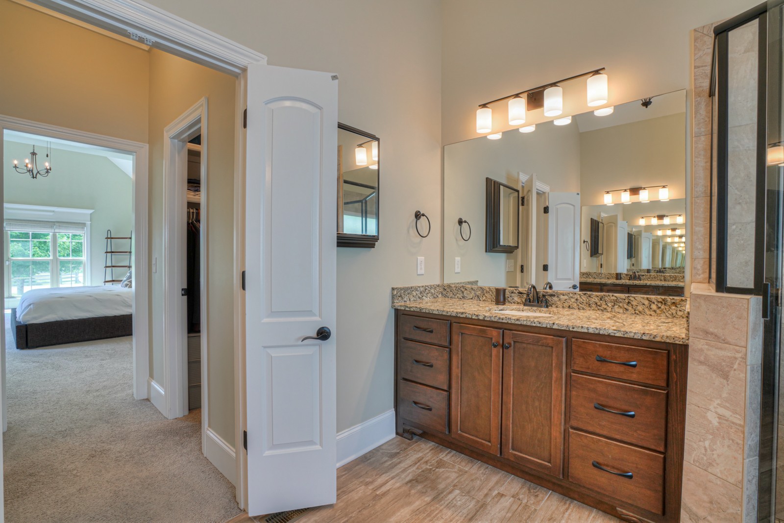9620 Mona Road Murfreesboro, TN 37129 - Photo 16 of 58 a bathroom with a granite countertop sink mirror and a