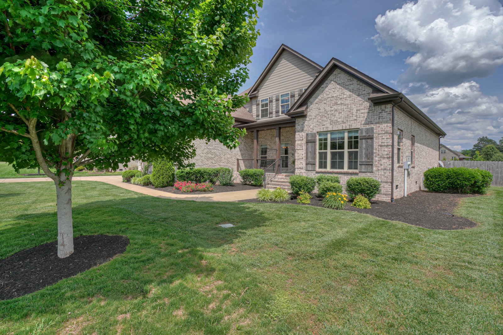 9620 Mona Road Murfreesboro, TN 37129 - Photo 2 of 58 a front view of a house with a yard and trees