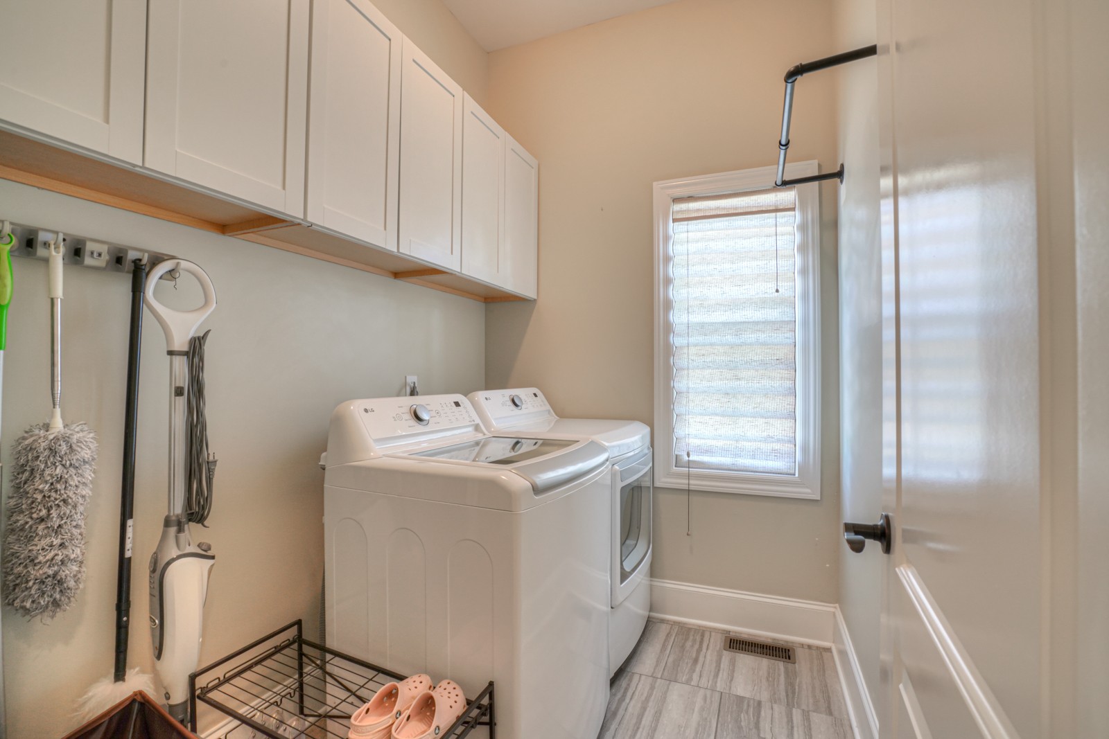 9620 Mona Road Murfreesboro, TN 37129 - Photo 29 of 58 a utility room with cabinets washer and dryer