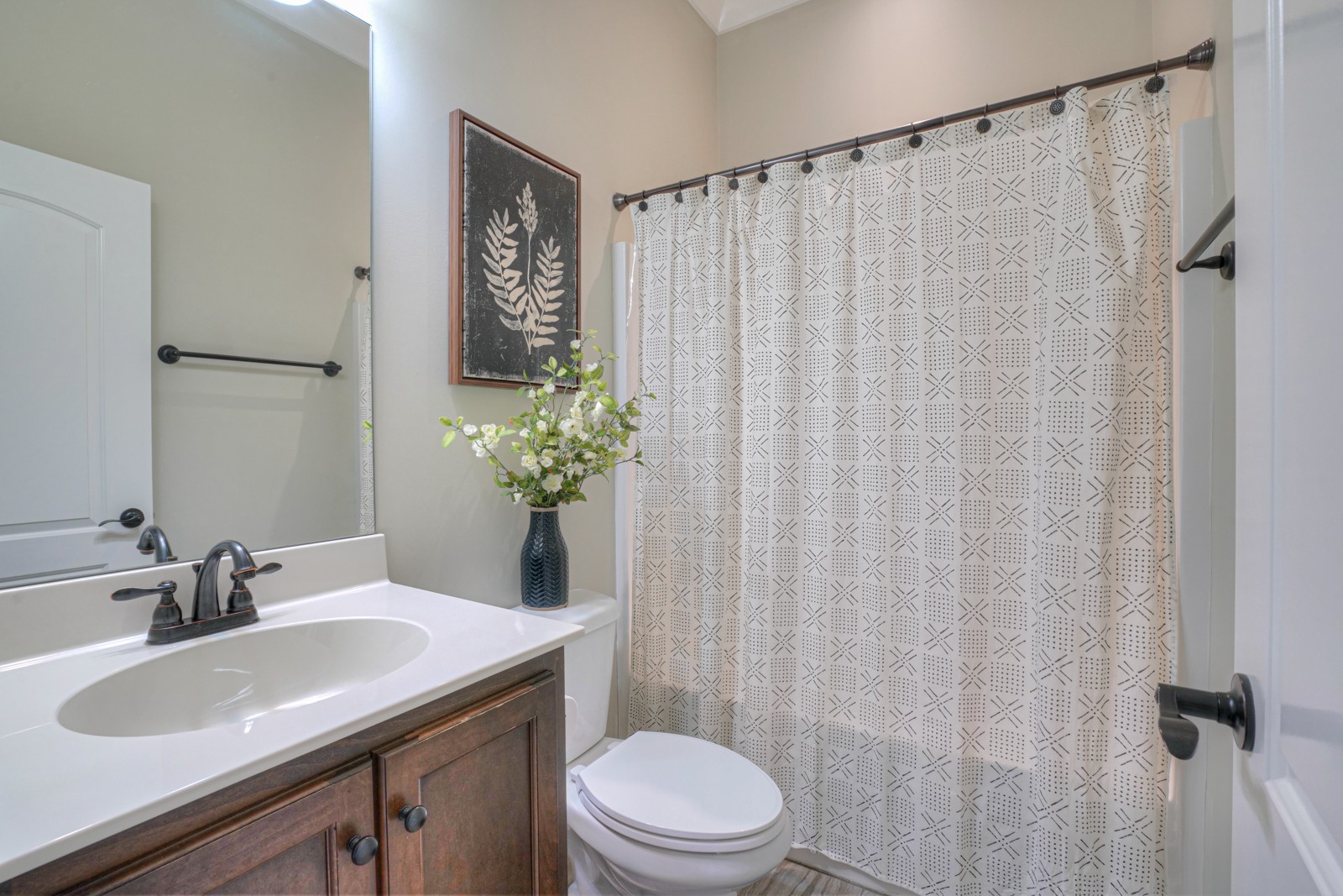 9620 Mona Road Murfreesboro, TN 37129 - Photo 30 of 58 a bathroom with a sink toilet and a mirror