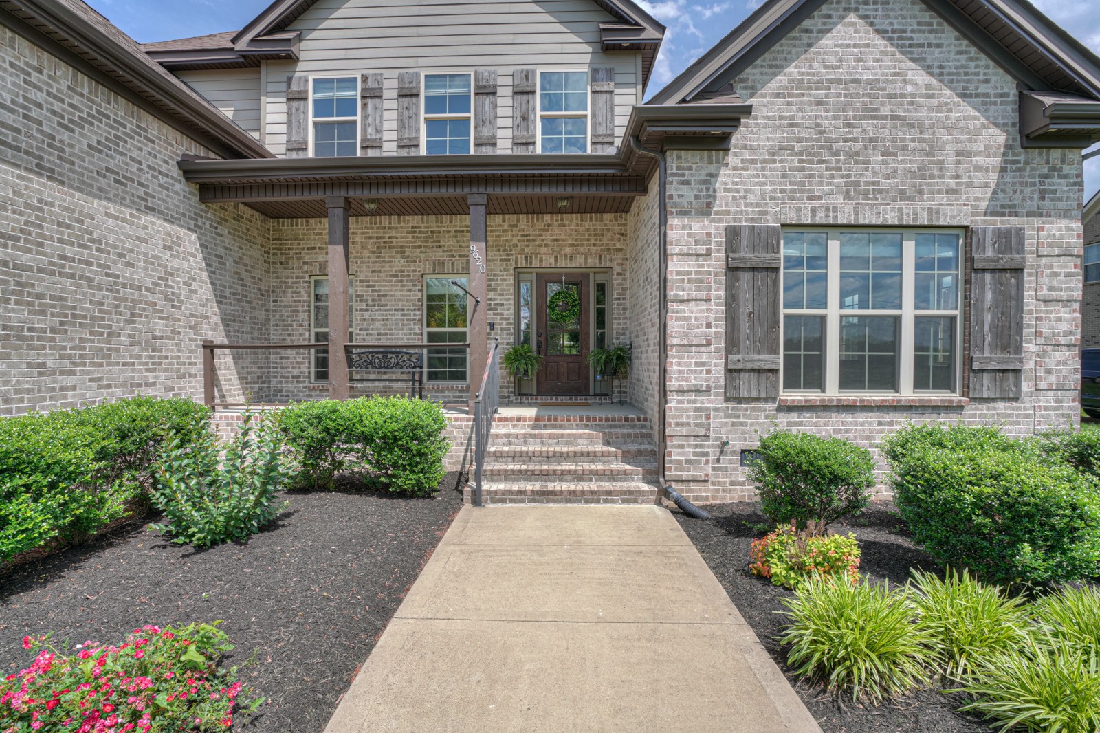 9620 Mona Road Murfreesboro, TN 37129 - Photo 3 of 58 a front view of a house with a garden