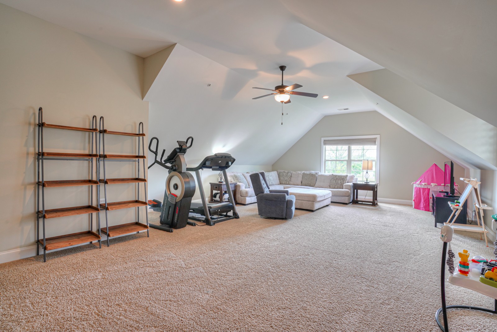 9620 Mona Road Murfreesboro, TN 37129 - Photo 40 of 58 a view of a livingroom with furniture and a ceiling fan