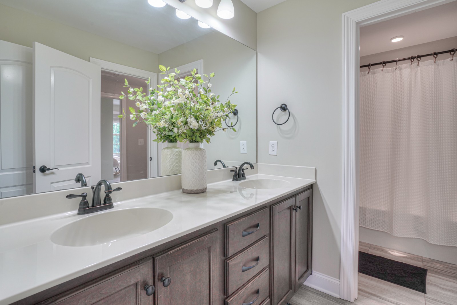 9620 Mona Road Murfreesboro, TN 37129 - Photo 43 of 58 a bathroom with a granite countertop sink and a mirror