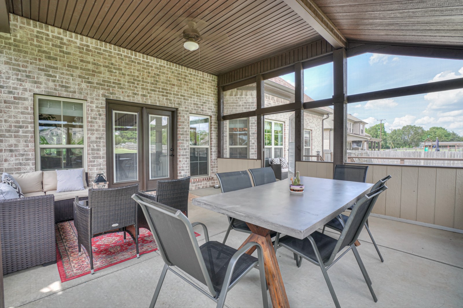 9620 Mona Road Murfreesboro, TN 37129 - Photo 49 of 58 a view of a dining room with furniture large windows and wooden floor