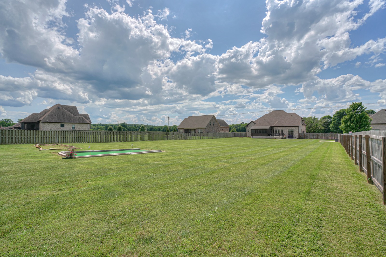9620 Mona Road Murfreesboro, TN 37129 - Photo 54 of 58 a view of a golf course with a lake