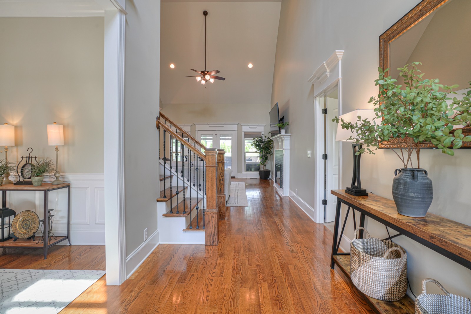 9620 Mona Road Murfreesboro, TN 37129 - Photo 7 of 58 a view of a hallway with wooden floor and staircase