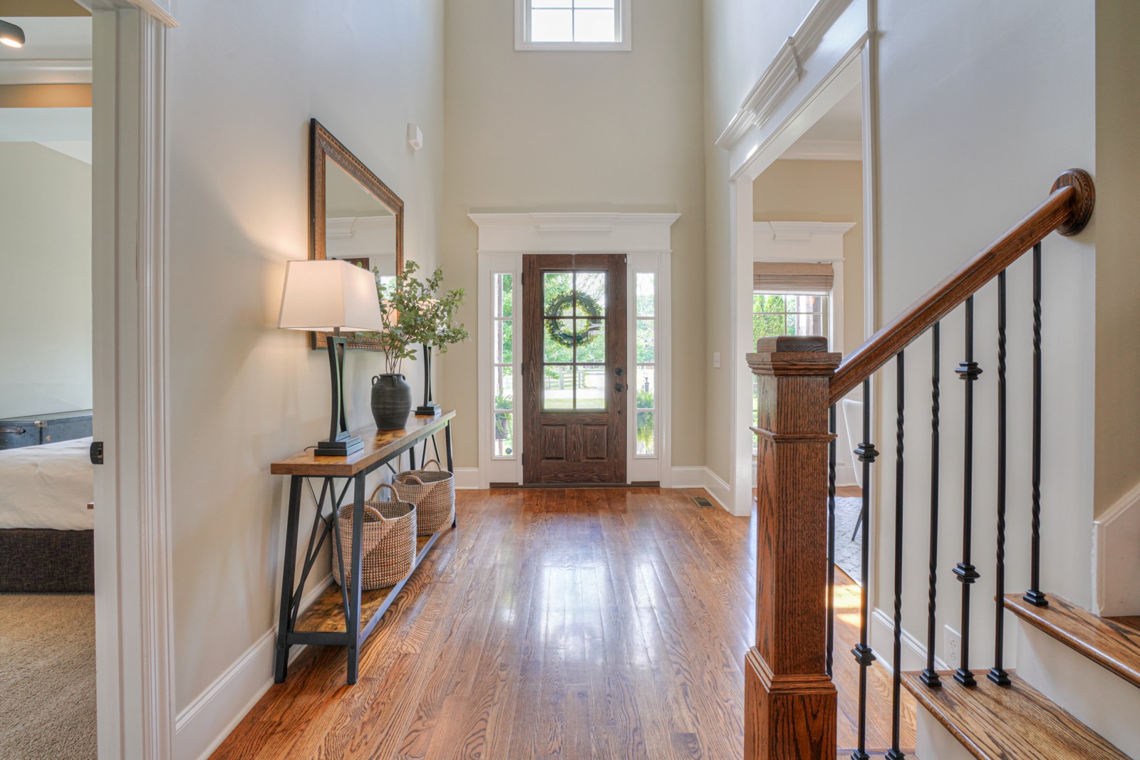 9620 Mona Road Murfreesboro, TN 37129 - Photo 10 of 58 a view of a hallway with wooden floor and stairs