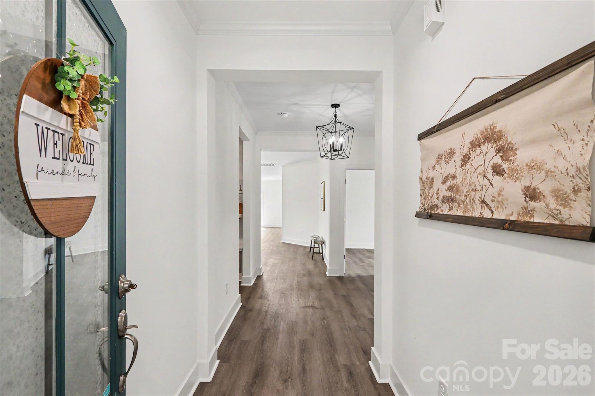 4115 Miller Road Salisbury, NC 28147 - Photo 3 of 26 a view of a hallway with wooden floor and staircase