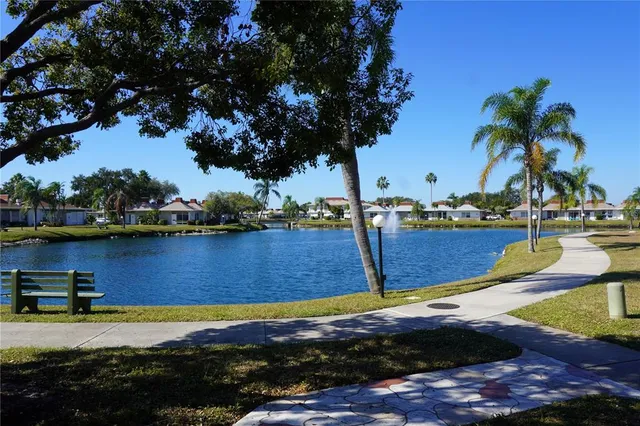 a view of a kitchen with a table and chairs