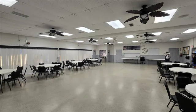 a room with furniture pool table and table soccer