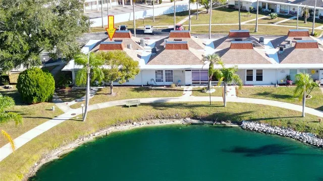a view of a swimming pool with a lounge chairs