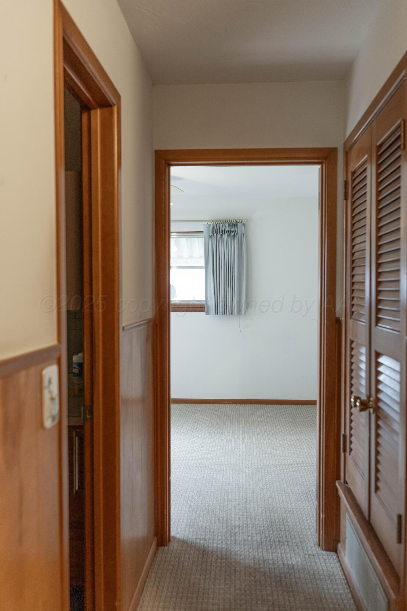 1315 South Canadian Street Wheeler, TX 79096 - Photo 36 of 44 a view of a room with a wardrobe space