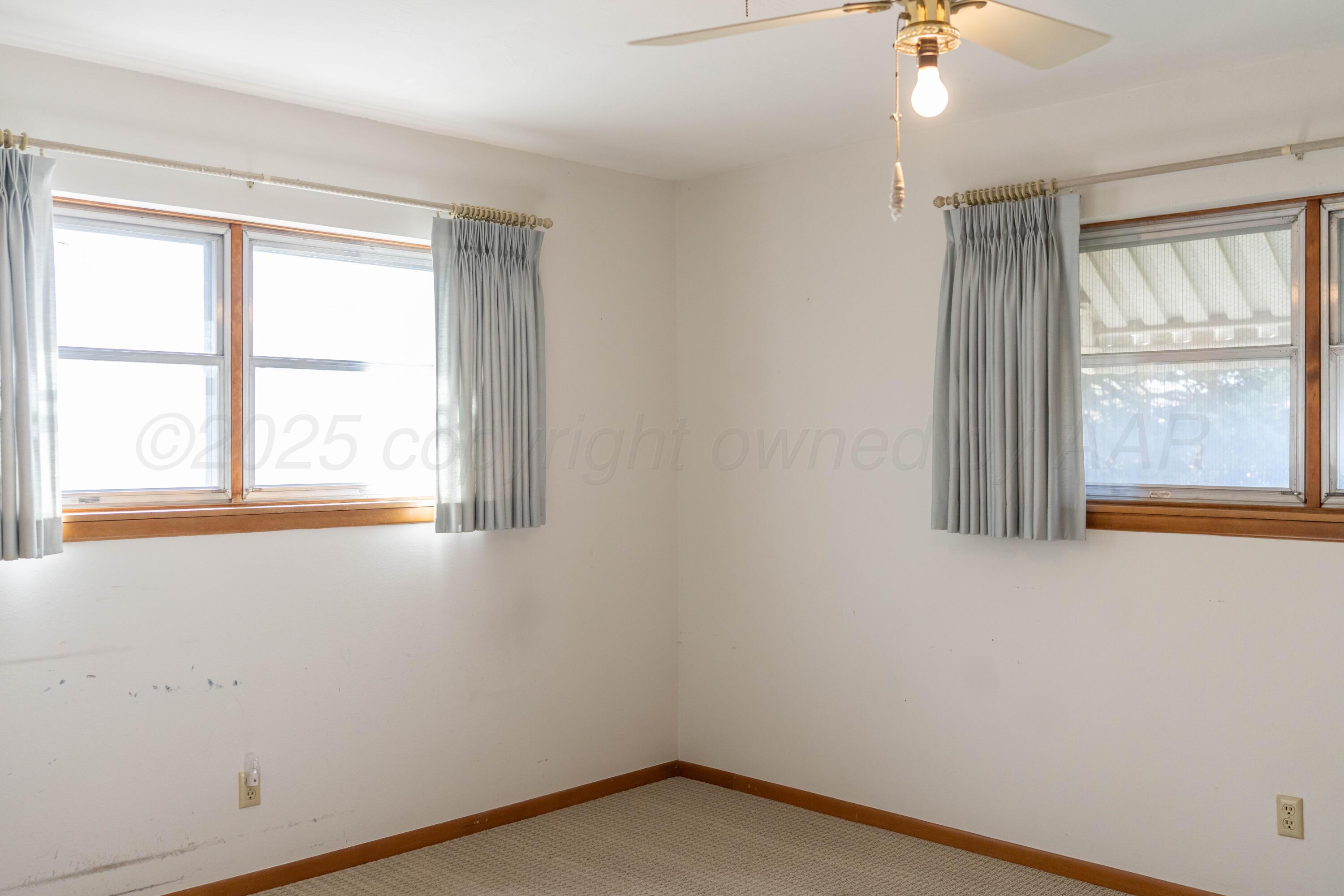 1315 South Canadian Street Wheeler, TX 79096 - Photo 37 of 44 an empty room with a window