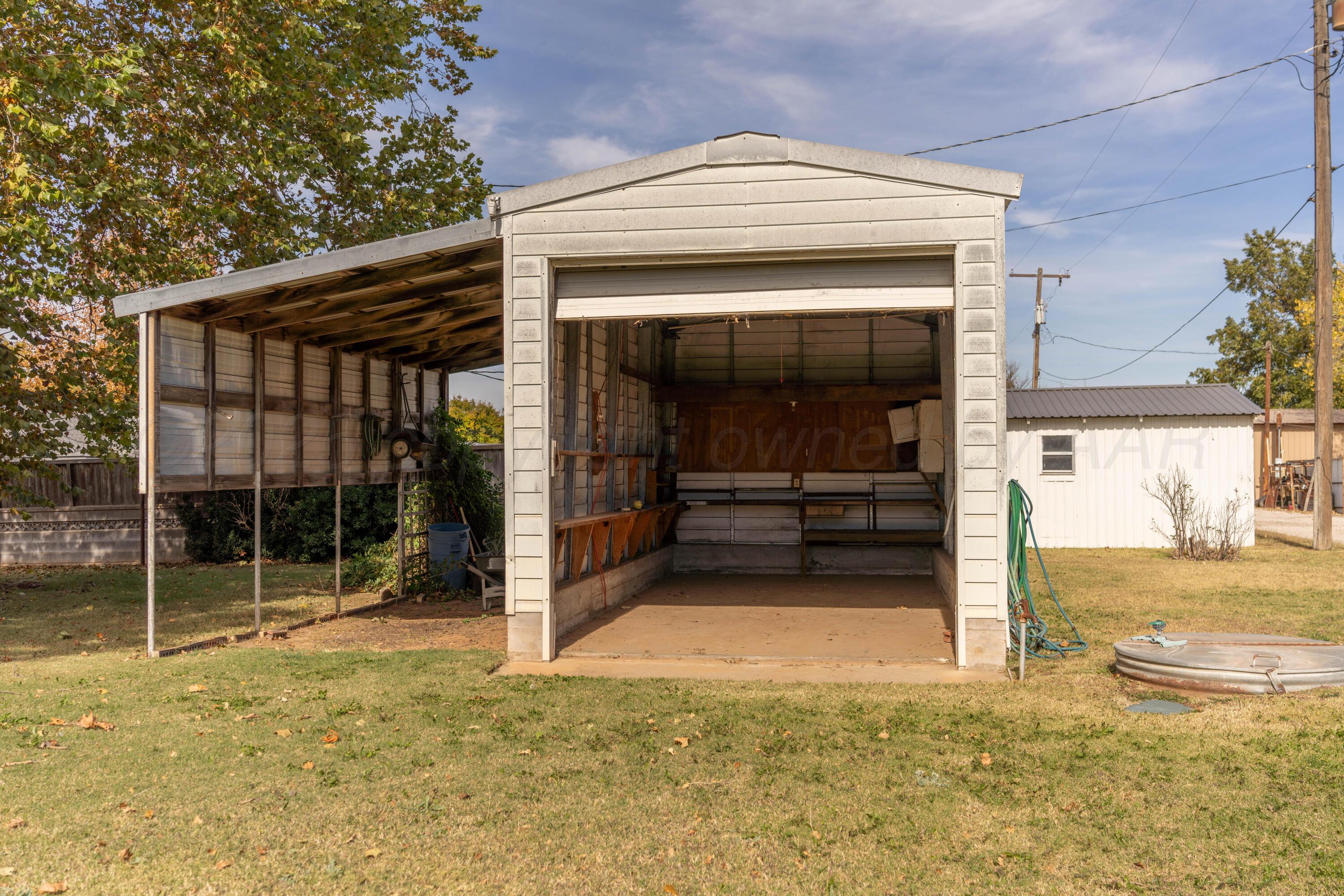 1315 South Canadian Street Wheeler, TX 79096 - Photo 8 of 44 a view of room that has a fireplace