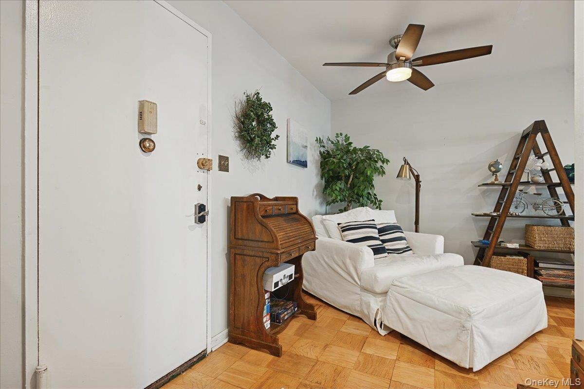 700 Shore Road, Unit 4O Long Beach, NY 11561 - Photo 5 of 42 a bedroom with furniture and a window