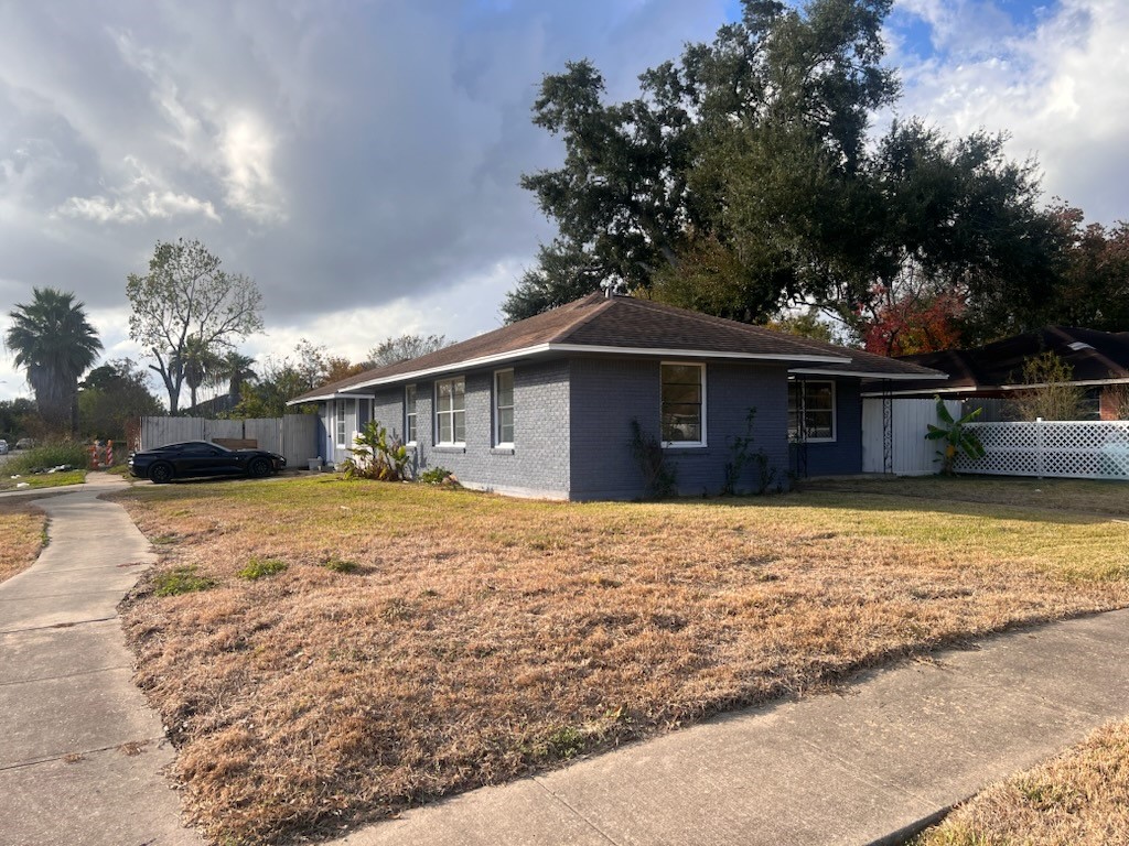 2146 Minnesota Street Houston, TX 77034 - Photo 1 of 22 a front view of a house with a yard and garage