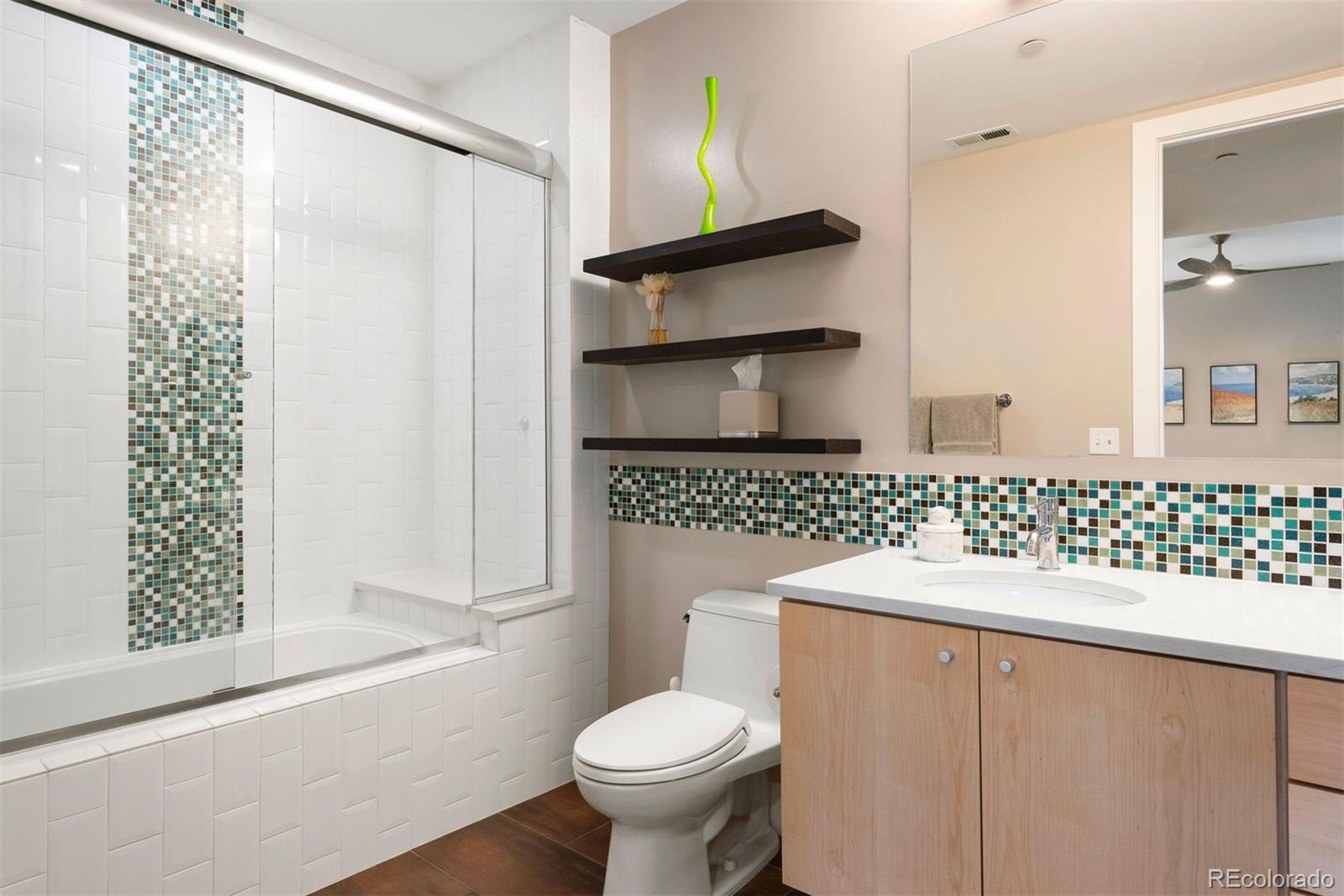 340 South Lafayette Street, Unit 102 Denver, CO 80209 - Photo 20 of 35 a bathroom with a sink toilet and shower