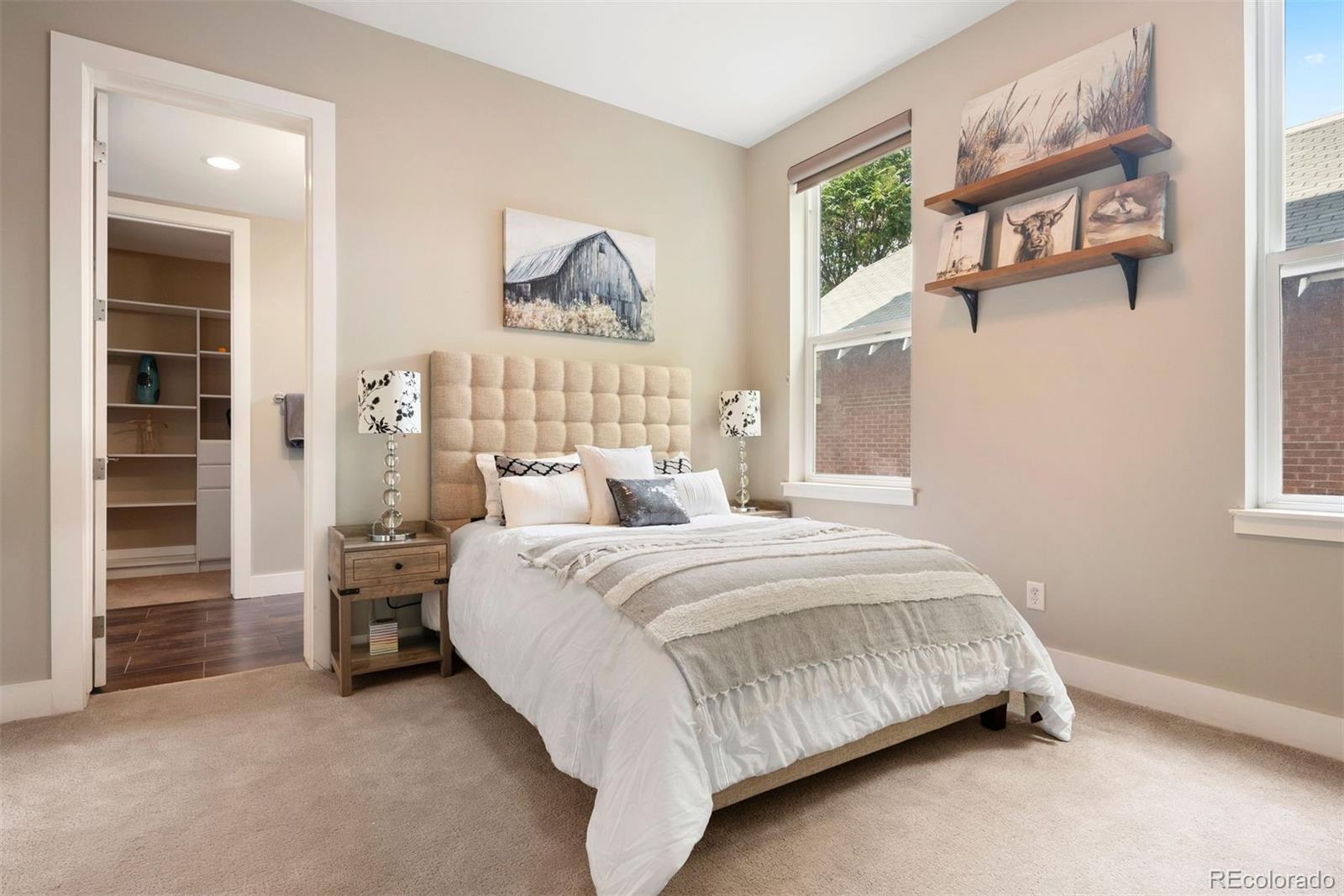 340 South Lafayette Street, Unit 102 Denver, CO 80209 - Photo 23 of 35 a bedroom with a bed and a window