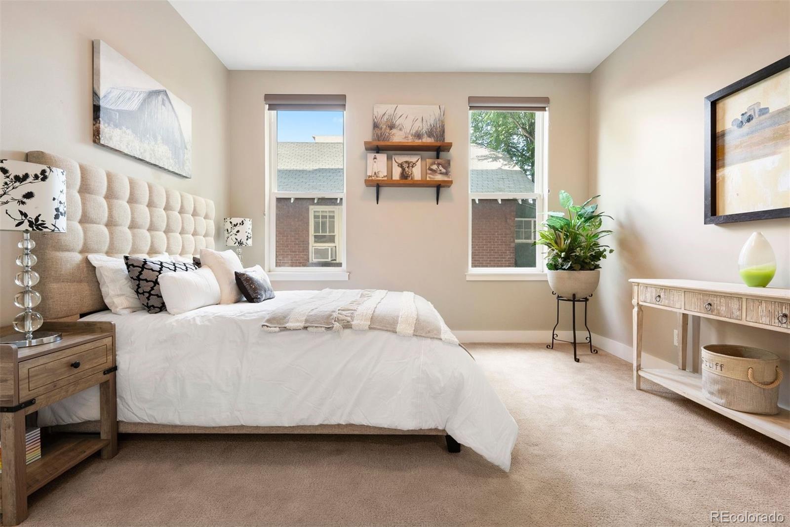 340 South Lafayette Street, Unit 102 Denver, CO 80209 - Photo 24 of 35 a bed room with a bed and a window