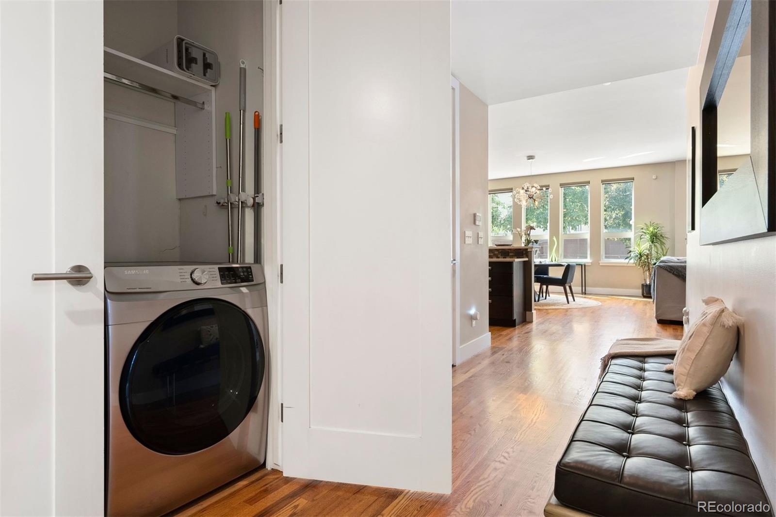340 South Lafayette Street, Unit 102 Denver, CO 80209 - Photo 30 of 35 a living room with furniture and a large window