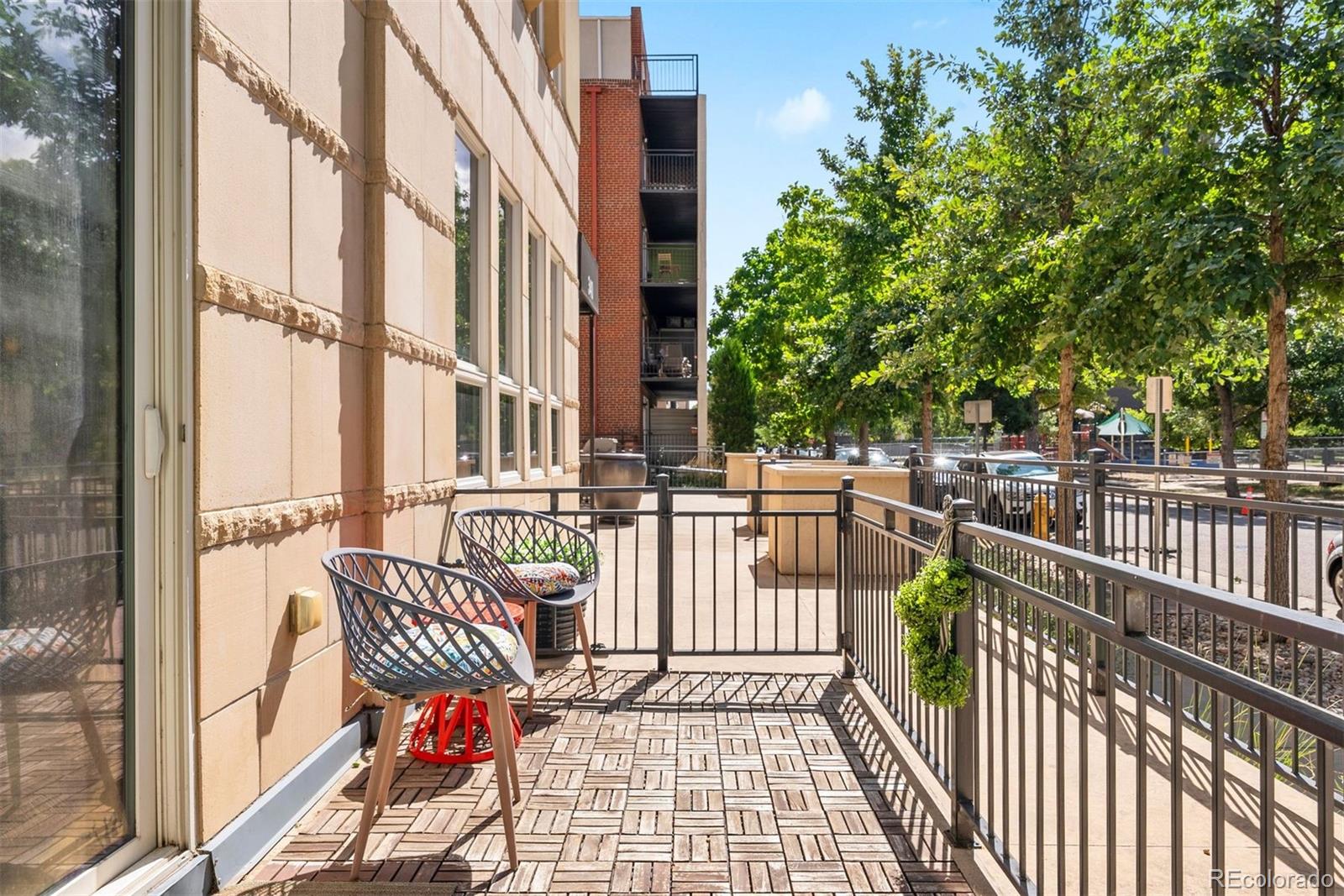 340 South Lafayette Street, Unit 102 Denver, CO 80209 - Photo 31 of 35 a view of a balcony with chairs