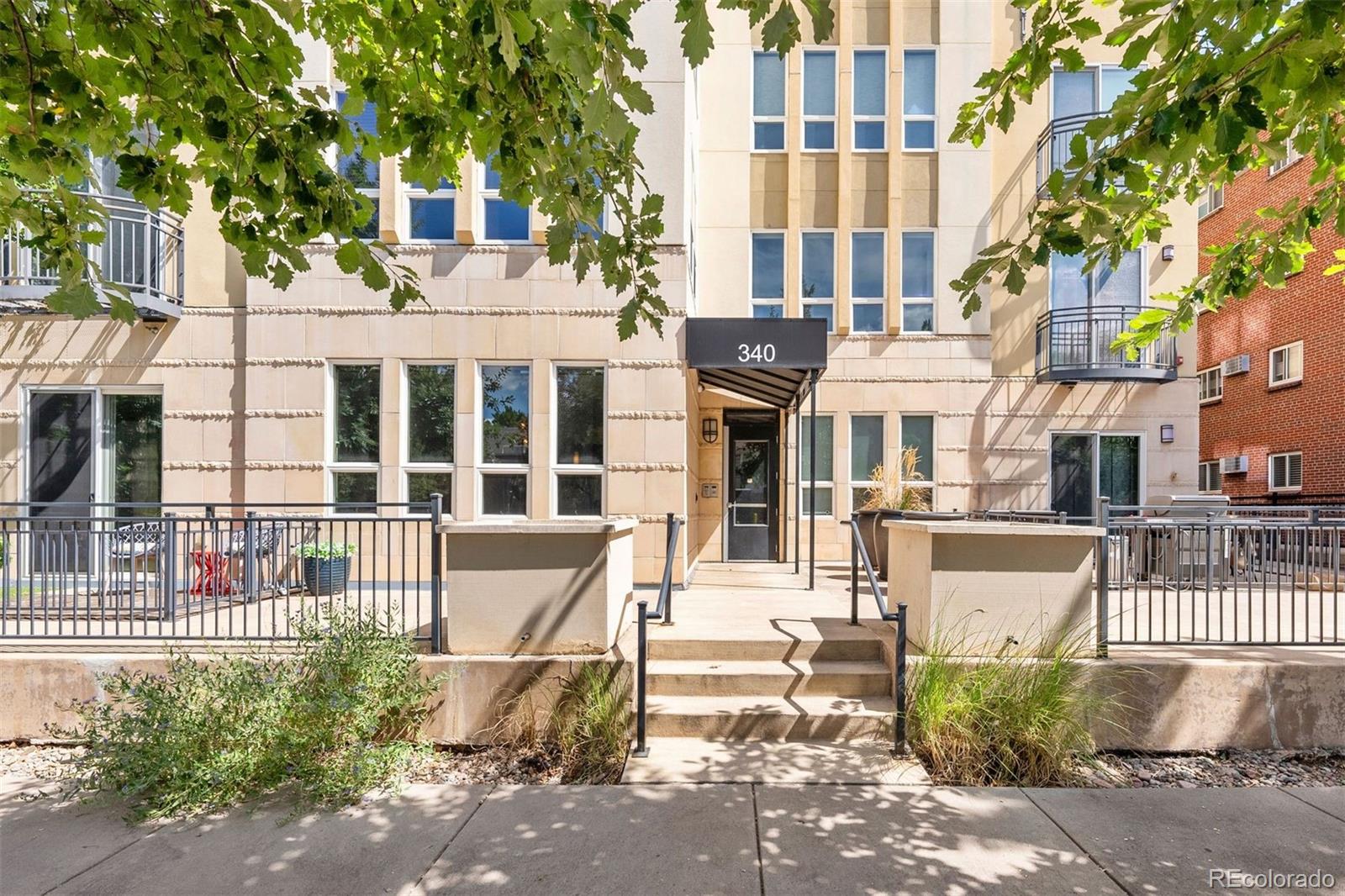 340 South Lafayette Street, Unit 102 Denver, CO 80209 - Photo 5 of 35 a view of a building with a street