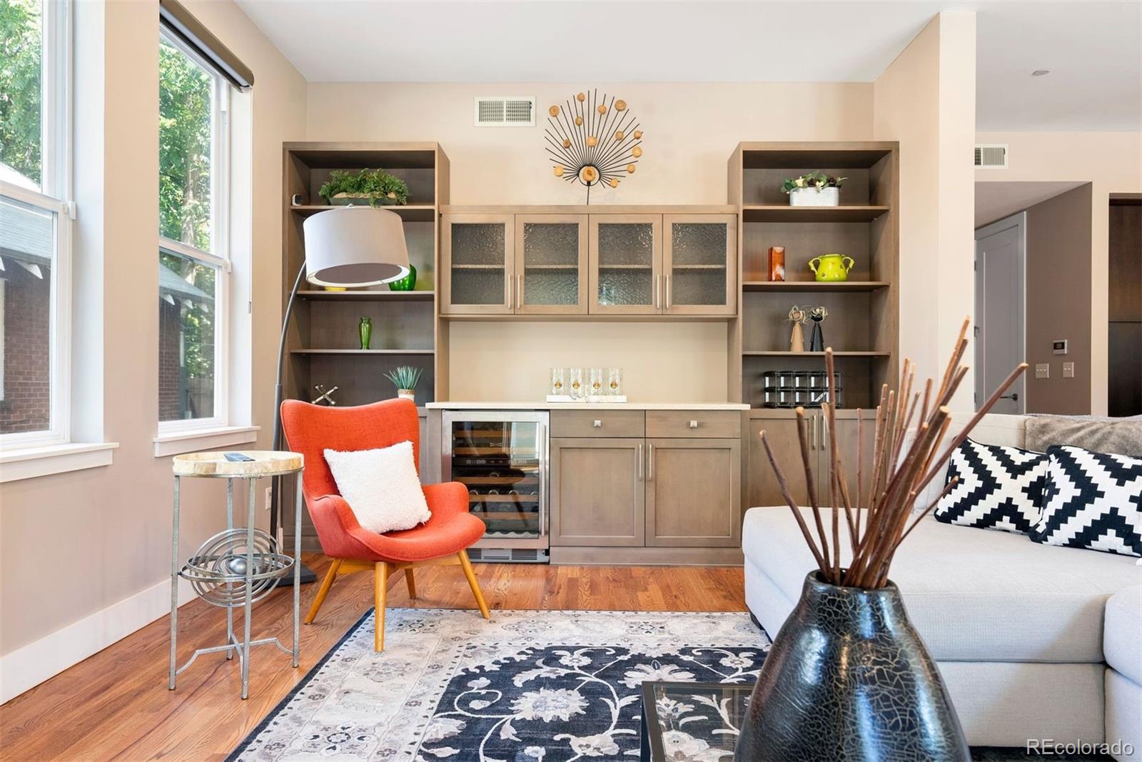 340 South Lafayette Street, Unit 102 Denver, CO 80209 - Photo 9 of 35 a living room with furniture a rug and a window