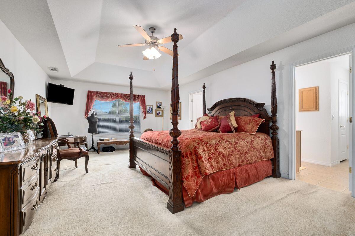 621 East Shipwreck Road Santa Rosa Beach, FL 32459 - Photo 13 of 25 a bedroom with a bed and potted plants with the dresser