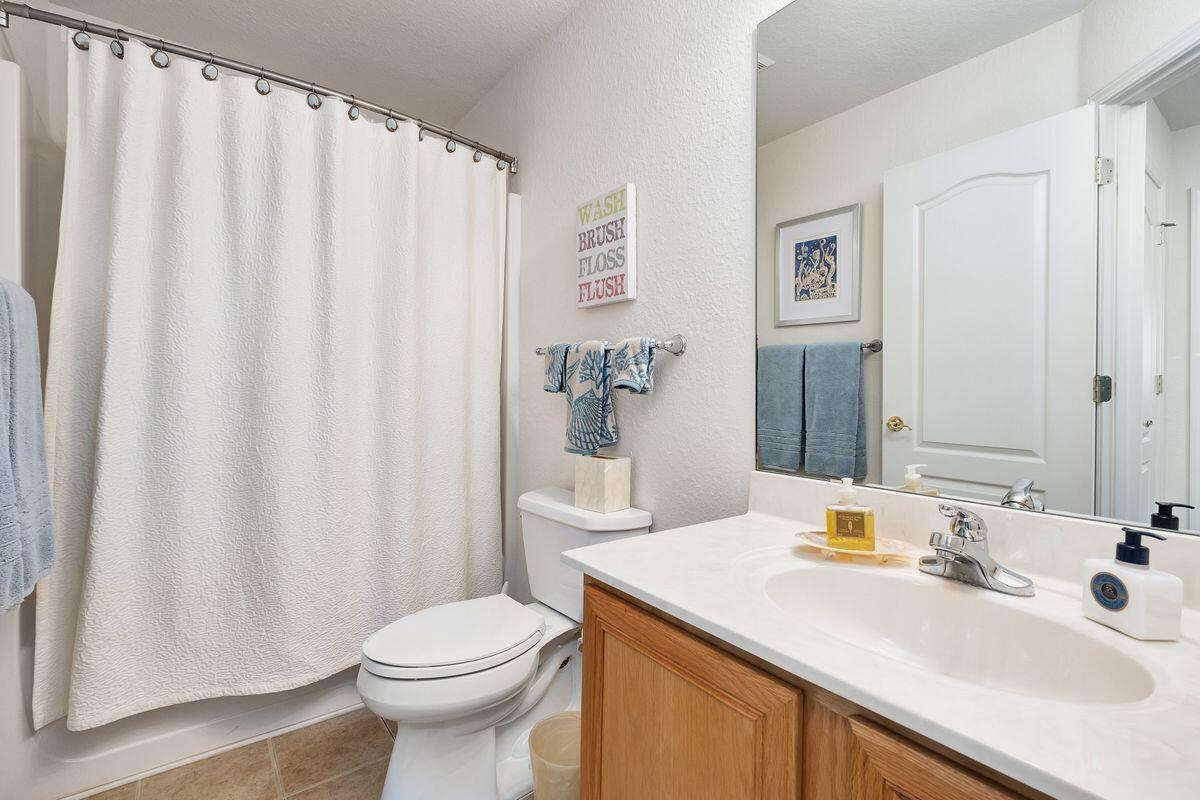 621 East Shipwreck Road Santa Rosa Beach, FL 32459 - Photo 18 of 25 a bathroom with a sink and a toilet