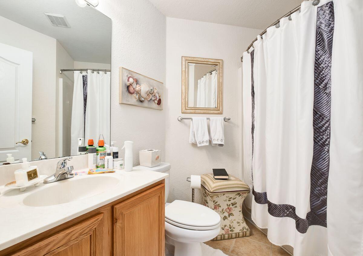 621 East Shipwreck Road Santa Rosa Beach, FL 32459 - Photo 20 of 25 a bathroom with a sink toilet and shower