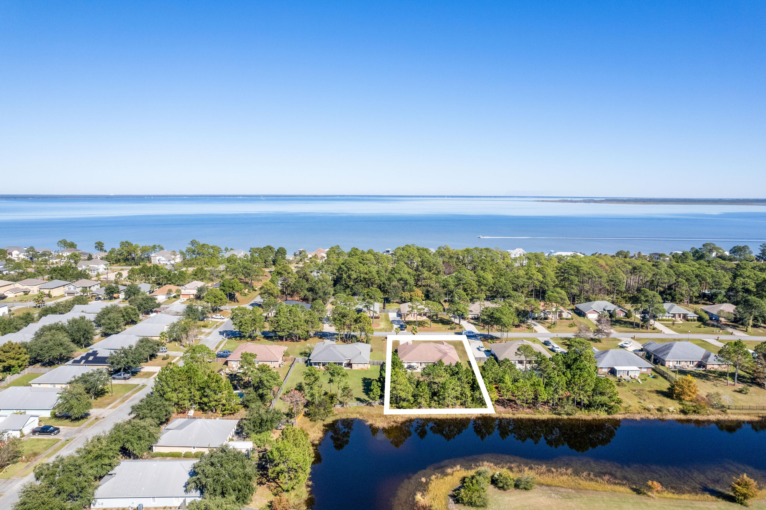 621 East Shipwreck Road Santa Rosa Beach, FL 32459 - Photo 2 of 25 an aerial view of residential building and ocean view