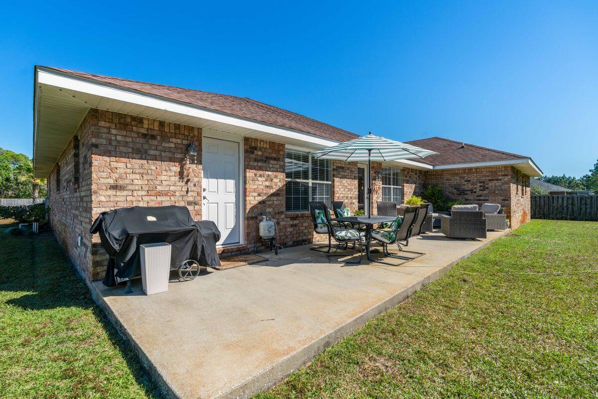 621 East Shipwreck Road Santa Rosa Beach, FL 32459 - Photo 23 of 25 a view of a house with patio