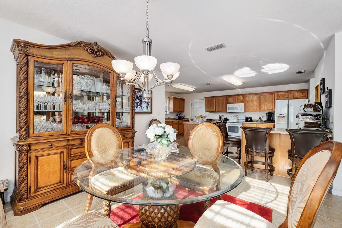 621 East Shipwreck Road Santa Rosa Beach, FL 32459 - Photo 9 of 25 a view of a dining room with furniture