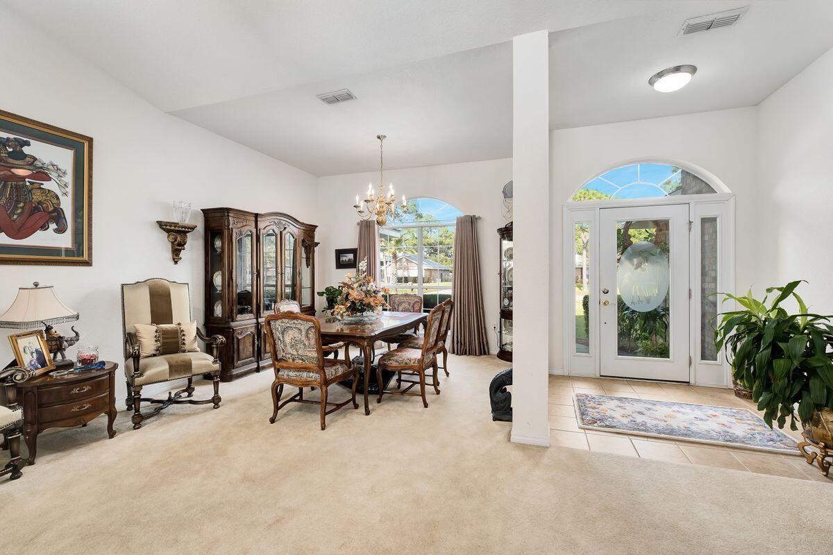 621 East Shipwreck Road Santa Rosa Beach, FL 32459 - Photo 10 of 25 a view of a livingroom with furniture and a window