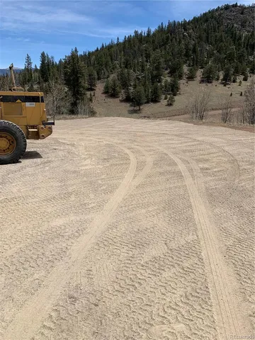 a view of a road with a snow on the road