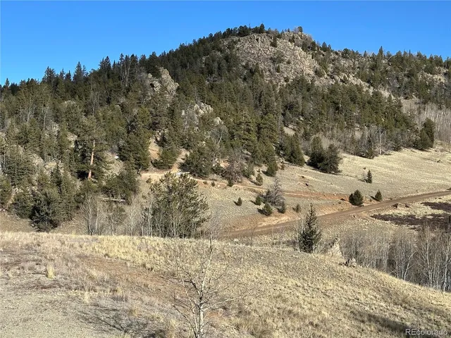a view of a snow on the top of a mountain