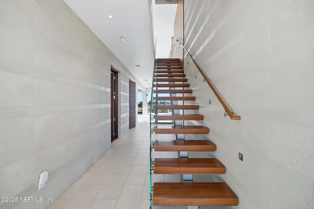 a front view of a house with a garage