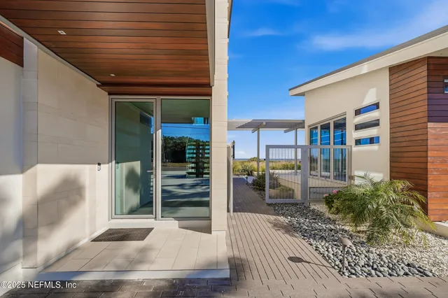 a room with gym equipment and a flat screen tv