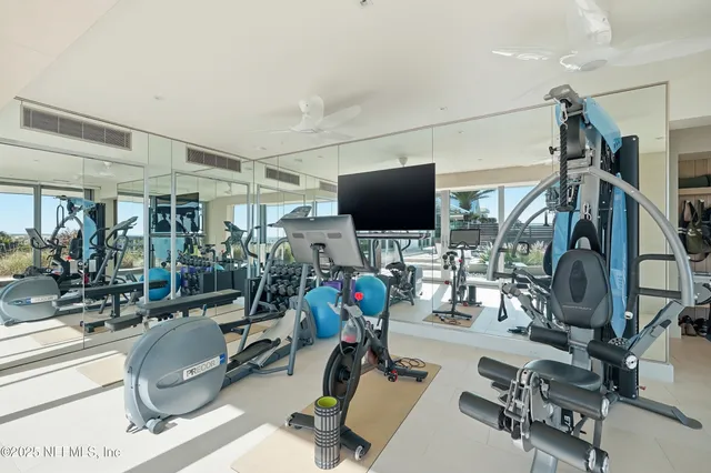 a bathroom with a sink a double vanity and a mirror