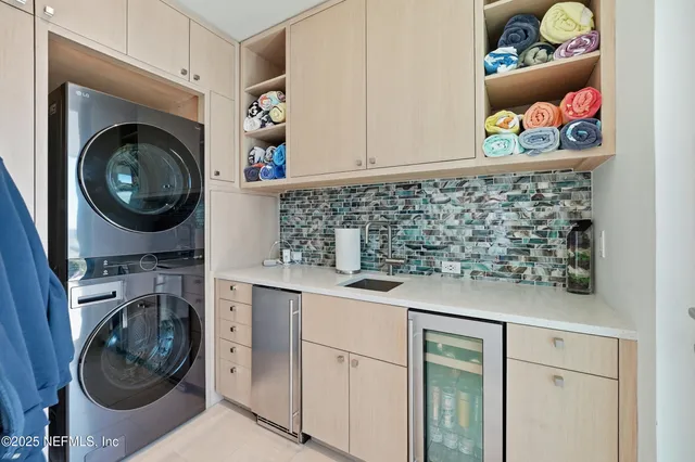 a bedroom with a bed and a lamp