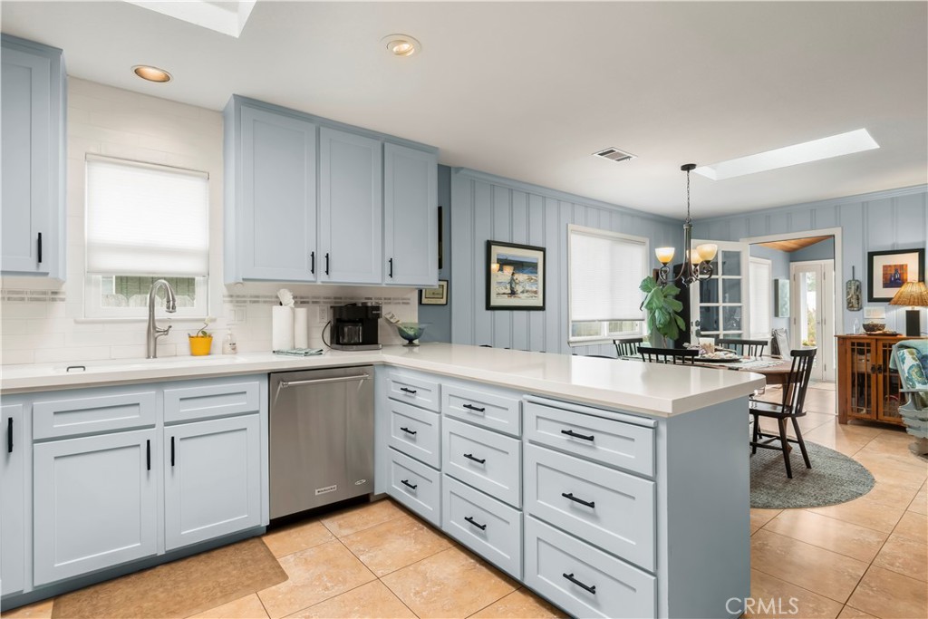 50 5th Street Cayucos, CA 93430 - Photo 24 of 47 a kitchen with cabinets and window