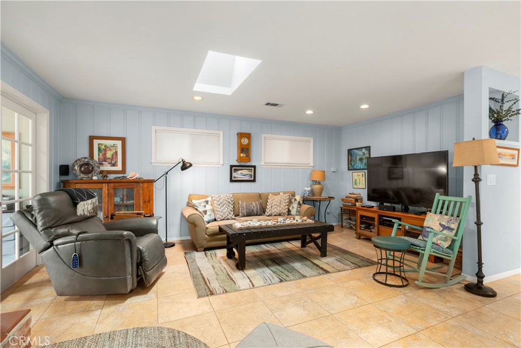 50 5th Street Cayucos, CA 93430 - Photo 25 of 47 a living room with furniture and a flat screen tv