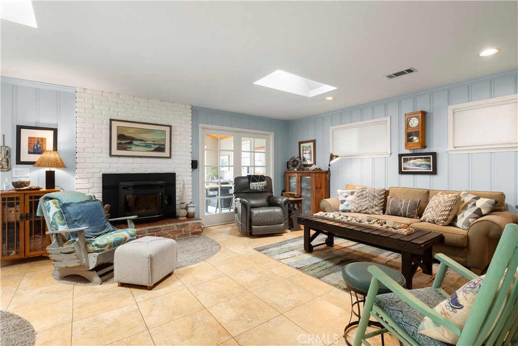 50 5th Street Cayucos, CA 93430 - Photo 27 of 47 a living room with furniture and a fireplace